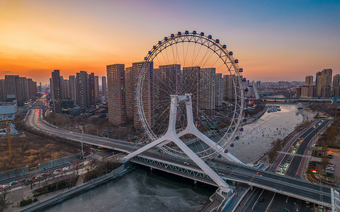 河口风光夕阳下的天津三岔河口和天津眼背景