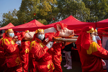 祭祖节日新年民俗文化抬年猪背景