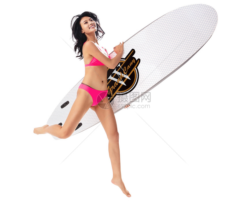 穿比基尼的美女拿着冲浪板图片