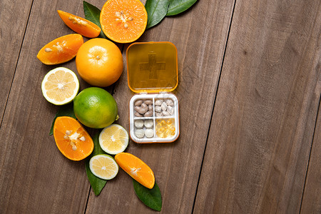 柑桔类水果和药盒高清图片