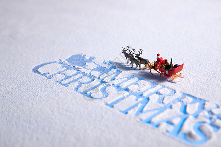 白色麋鹿圣诞节英文和坐雪橇的圣诞老人背景