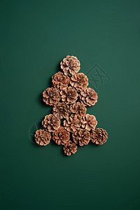 松果组成的圣诞树背景图片