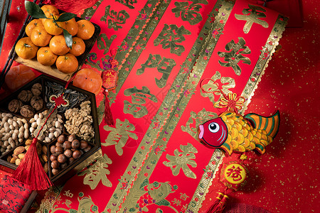 桔子和中式坚果果盘背景图片
