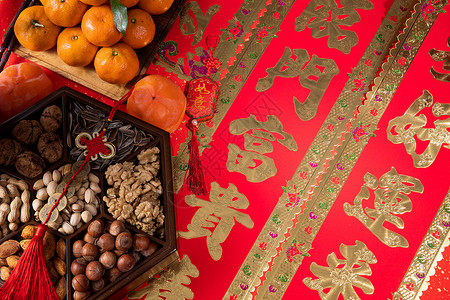 桔子和中式坚果果盘高清图片