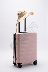 粉色漂亮行李箱行李箱背景