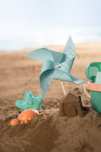 小桶玩具海滩静物背景