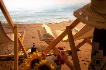 沙滩躺椅帽子日光浴高清图片