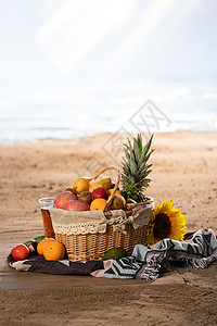 橘子海沙滩上的水果背景