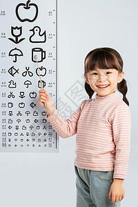 可爱的小女孩检查视力背景图片