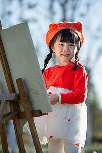 未成年人思想道德可爱的小女孩在户外画画背景