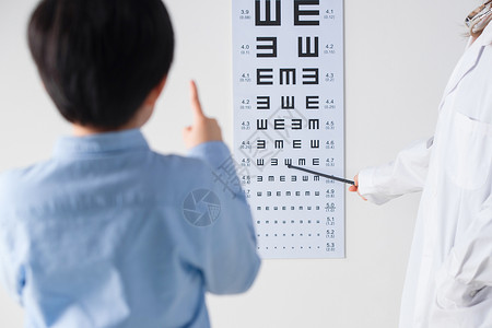 眼科技术小学男生测视力背景