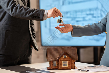 房屋代理房地产销售给顾客钥匙背景