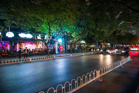 立德树人海报北京商业街夜景背景
