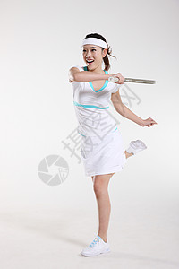 女子羽毛球东方青年女子打网球背景