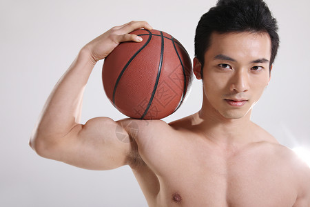 严肃的比赛东方青年男子打篮球背景