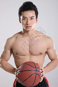 严肃的比赛东方青年男子拿篮球背景