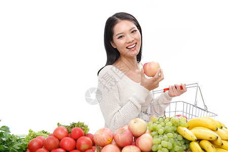 青年女人选购苹果背景图片