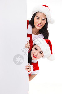 圣诞节日海报拿着白板的年轻女人背景