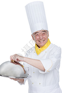 一个厨师拿着餐具图片