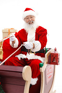圣诞老人坐在雪橇上图片