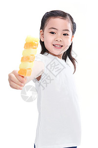 可爱的小女孩拿着冰棍图片