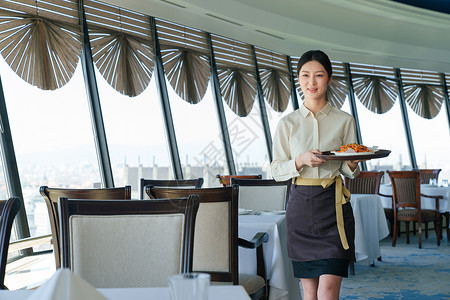 空中餐厅热情的服务员上菜背景