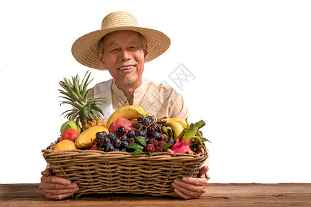 蔬菜水果商的老农民出示自家水果背景
