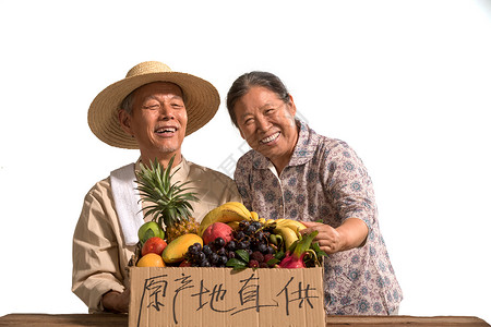蔬菜水果商的农民夫妇出示自家水果背景