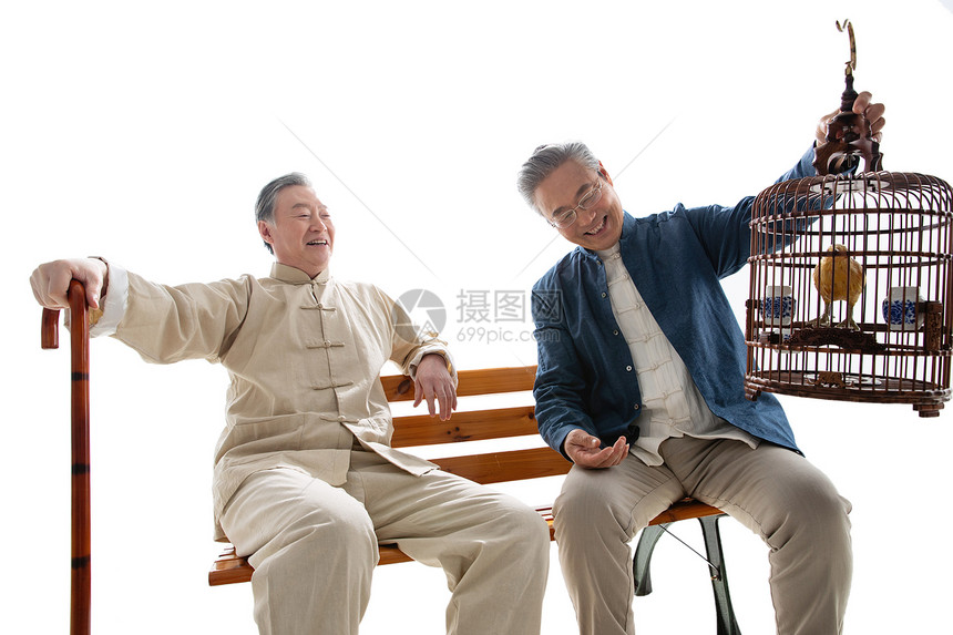 老年人拿着鸟笼聊天图片