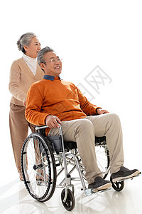 老人推着坐轮椅的老伴图片