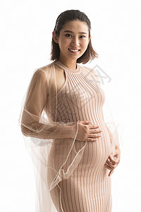 孕妇抚摸肚子背景图片