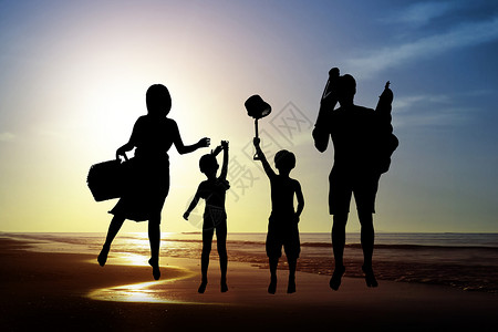 幸福家庭剪影幸福家庭在沙滩上玩耍背景