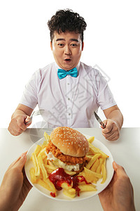 进食障碍小胖子吃汉堡包背景