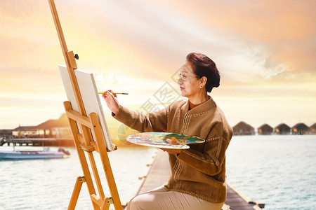 老人户外活动老年人在海边画画背景