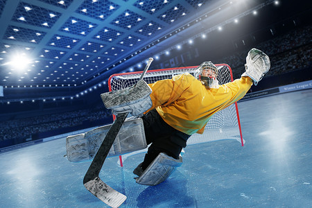 冰球运动员仅男人黄脚立高清图片