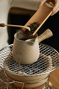 围炉炭火烤茶背景图片