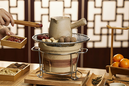 炭火围炉烤茶烤坚果红枣背景图片