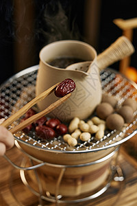 炭火围炉烤茶烤坚果红枣背景图片
