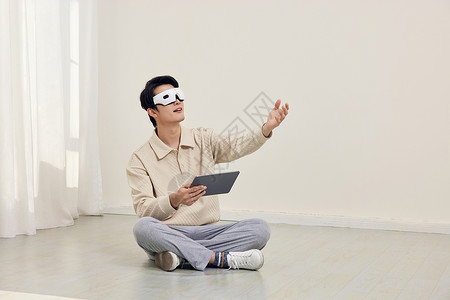 VR家装男性戴着vr眼镜进行虚拟家装背景
