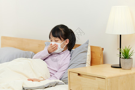 发烧的女孩小女孩生病卧床咳嗽背景