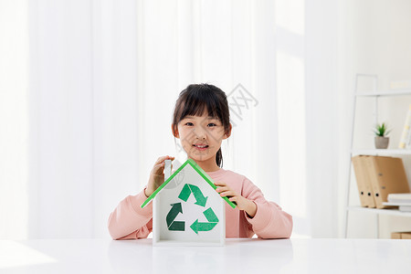 小女孩倡导绿色低碳环保背景