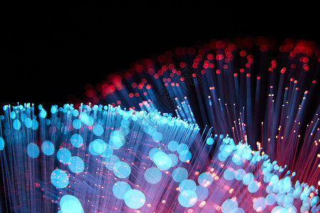 蓝色有科技感红色与蓝色光纤交织背景