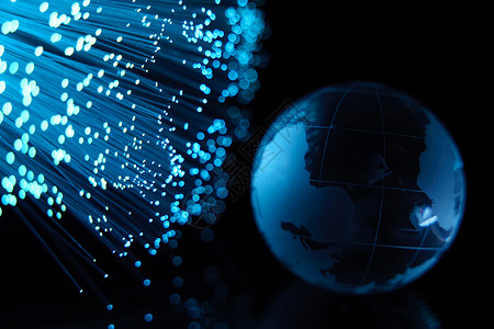 地球互联网地球与蓝色光纤背景