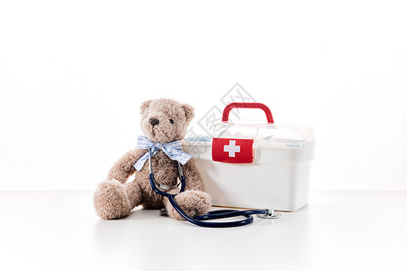 小熊玩偶和礼盒医疗小熊和医药箱背景