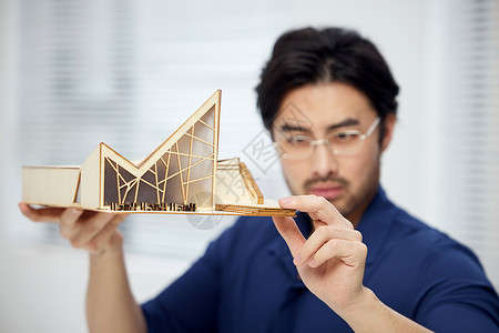 平面展示研究建筑模型结构的设计师背景