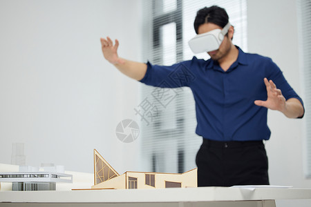 VR模型设计师使用vr设备观看建模效果背景