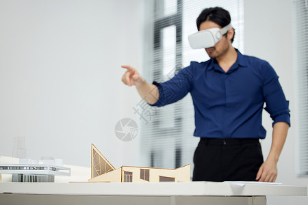 3D建筑建模建筑设计工程师使用vr设备建模背景