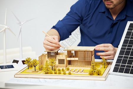 节能建筑工程师设计新能源建筑社区特写背景