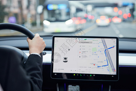 科技绿色城市行驶中的车载电子屏特写背景