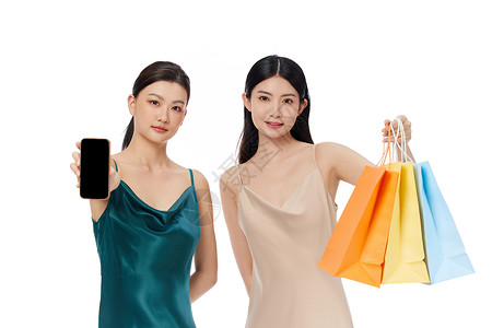 决战双11聚优惠拎着购物袋的闺蜜女性展示手机背景